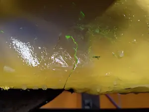 Evaluación de extensión de fisura mediante partículas magnetizables fluorescentes en ensayo no destructivo